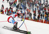 Reto Schmidiger of Switzerland skiing in the second run of the men slalom race of Audi FIS Alpine skiing World cup in Kitzbuehel, Austria. Men slalom race of Audi FIS Alpine skiing World cup season 2014-2015, was held on Sunday, 25th of January 2015 on Ganslern course in Kitzbuehel, Austria
