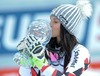 Overall World cup winner Anna Fenninger of Austria celebrates with her crystal globe for the Overall World cup during the overall winner Ceremony for the Overall FIS World Cup at the Roc de Fer in Meribel, France on 2015/03/22.
