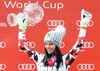 Overall World cup winner Anna Fenninger of Austria celebrates with her crystal globe for the Overall World cup during the overall winner Ceremony for the Overall FIS World Cup at the Roc de Fer in Meribel, France on 2015/03/22.
