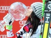 Overall World cup winner Anna Fenninger of Austria celebrates with her crystal globe for the Overall World cup during the overall winner Ceremony for the Overall FIS World Cup at the Roc de Fer in Meribel, France on 2015/03/22.
