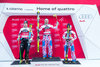 2nd placed Hannes Reichelt of Austria ( L ), winner Adrien Theaux of France ( C ) and 3rd placed David Poisson of France ( R ) during the award winner ceremony of the men downhill of the Santa Caterina FIS Ski Alpine World Cup at the Deborah Compagnoni Course in Santa Caterina, Italy on 2015/12/29.
