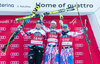 2nd placed Hannes Reichelt of Austria ( L ), winner Adrien Theaux of France ( C ) and 3rd placed David Poisson of France ( R ) during the award winner ceremony of the men downhill of the Santa Caterina FIS Ski Alpine World Cup at the Deborah Compagnoni Course in Santa Caterina, Italy on 2015/12/29.
