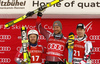 Winner Aksel Lund Svindal of Norway (M), second placed Andrew Weibrecht of USA (L) and third placed Hannes Reichelt of Austria (R) celebrate their medals won in the men super-g race of Audi FIS Alpine skiing World cup in Kitzbuehel, Austria. Men super-g race of Audi FIS Alpine skiing World cup was held on Hahnenkamm course in Kitzbuehel, Austria, on Friday, 22nd of January 2016.
