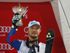 Third placed Alexander Khoroshilov of Russia celebrates his medal won in the men slalom race of Audi FIS Alpine skiing World cup in Schladming, Austria. Men slalom race of Audi FIS Alpine skiing World cup, The Night race, was held in Schladming, Austria, on Tuesday, 26th of January 2016.
