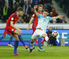 John Stones (no.6) of England (L) and Benjamin Verbic (no.21) (R) of Slovenia during football match of FIFA World cup qualifiers between Slovenia and England. FIFA World cup qualifiers between Slovenia and England was played on Tuesday, 11th of October 2016 in Stozice arena in Ljubljana, Slovenia.
