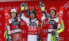 Second placed Henrik Kristoffersen of Norway (L), winner Marcel Hirscher of Austria (M) and Zan Kranjec of Slovenia (R)  celebrate their medals won in the men giant slalom race of the Audi FIS Alpine skiing World cup in Alta Badia, Italy. Men giant slalom race of the Audi FIS Alpine skiing World cup, was held on Gran Risa course in Alta Badia, Italy, on Sunday, 17th of December 2017.
