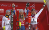 Winner Mikaela Shiffrin of USA (M), second placed Bernadette Schild of Austria (L) and third placed Frida Hansdotter of Sweden (R) celebrate their medals won in the women night slalom race of the Audi FIS Alpine skiing World cup in Flachau, Austria. Women slalom race of the Audi FIS Alpine skiing World cup was held in Flachau, Austria, on Tuesday, 9th of January 2018.
