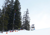 Coaches observing racers high up from the trees during second training run for men downhill race of the Audi FIS Alpine skiing World cup in Garmisch-Partenkirchen, Germany. Second training run for men downhill race of the Audi FIS Alpine skiing World cup was held on Kandahar track in Garmisch-Partenkirchen, Germany, on Friday, 26th of January 2018.
