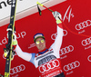Winner Beat Feuz of Switzerland celebrate on the podium after men downhill race of the Audi FIS Alpine skiing World cup in Garmisch-Partenkirchen, Germany. Men downhill race of the Audi FIS Alpine skiing World cup was held on Kandahar track in Garmisch-Partenkirchen, Germany, on Saturday, 27th of January 2018.
