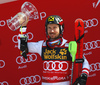 Winner Marcel Hirscher of Austria celebrates on the podium after the men slalom race of the Audi FIS Alpine skiing World cup in Kranjska Gora, Slovenia. Men slalom race of the Audi FIS Alpine skiing World cup was held on Podkoren track in Kranjska Gora, Slovenia, on Sunday, 4th of March 2018.
