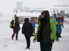 Racers and coaches are leaving finish area, after race was canceleddue to heavy snow, fog and wind. First men race of the Audi FIS Alpine skiing World cup season 2018-2019 was planned to be held on Rettenbach glacier above Soelden, Austria, on Sunday, 28th of October 2018.
