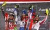 Winner Petra Vlhova of Slovakia (M), second placed Mikaela Shiffrin of USA (L) and third placed  Katharina Liensberger of Austria (R) celebrating on the podium after the women slalom race of the Audi FIS Alpine skiing World cup  Flachau, Austria. Women slalom race of the Audi FIS Alpine skiing World cup season 2018-2019 was held Flachau, Austria, on Tuesday, 8th of January 2019.
