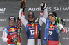 Winner Dominik Paris of Italy (M), second placed Beat Feuz of Switzerland (L) and third placed Otmar Striedinger of Austria (R) celebrate their medals won in the men downhill race of the Audi FIS Alpine skiing World cup Kitzbuehel, Austria. Men downhill Hahnenkamm race of the Audi FIS Alpine skiing World cup season 2018-2019 was held Kitzbuehel, Austria, on Friday, 25th of January 2019.
