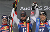 Winner Dominik Paris of Italy (M), second placed Beat Feuz of Switzerland (L) and third placed Otmar Striedinger of Austria (R) celebrate their medals won in the men downhill race of the Audi FIS Alpine skiing World cup Kitzbuehel, Austria. Men downhill Hahnenkamm race of the Audi FIS Alpine skiing World cup season 2018-2019 was held Kitzbuehel, Austria, on Friday, 25th of January 2019.
