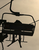 Ski lift with skiers during the men giant slalom race of the Audi FIS Alpine skiing World cup in Kranjska Gora, Slovenia. Men giant slalom race of the Audi FIS Alpine skiing World cup season 2018-2019 was held on Podkoren course in Kranjska Gora, Slovenia, on Saturday, 9th of March 2019.
