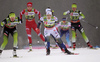 Katja Visnar of Slovenia (L) and Johanna Hagstroem of Sweden (M) leading the heat 4 in  finals of women sprint race of FIS Cross country skiing World Cup in Planica, Slovenia. Finals of women sprint finals of FIS Cross country skiing World Cup in Planica, Slovenia were held on Saturday, 21st of December 2019 in Planica, Slovenia.
