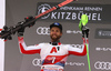 Second placed Marco Schwarz of Austria celebrating on the podium after the men slalom race of the Audi FIS Alpine skiing World cup in Kitzbuehel, Austria. Men slalom race of Audi FIS Alpine skiing World cup 2019-2020, was held on Ganslernhang in Kitzbuehel, Austria, on Sunday, 26th of January 2020. <br> 

