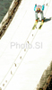 Jussi Hautamaeki of Finland on inrun during first training jump of FIS Ski jumping World Cup finals in Planica, Slovenia. Training and qualification sessions for FIS Ski jumping World cup were held in Planica, Slovenia, on K215 ski flying hill on 13th of March, 2008.  <br> FIS Ski jumping World cup finals were held in Planica, Slovenia between 13th and 16th of March 2008.
