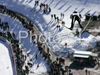 Adam Malysz of Poland soars through the air during first training jump of FIS Ski jumping World Cup finals in Planica, Slovenia. Training and qualification sessions for FIS Ski jumping World cup were held in Planica, Slovenia, on K215 ski flying hill on 13th of March, 2008.  <br> FIS Ski jumping World cup finals were held in Planica, Slovenia between 13th and 16th of March 2008.
