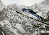 Juha-Matti Ruuskanen of Finland soars through the air during qualification jump of FIS Ski jumping World Cup finals in Planica, Slovenia. Training and qualification sessions for FIS Ski jumping World cup were held in Planica, Slovenia, on K215 ski flying hill on 13th of March, 2008.  <br> FIS Ski jumping World cup finals were held in Planica, Slovenia between 13th and 16th of March 2008.
