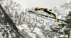 Janne Happonen of Finland soars through the air during qualification jump of FIS Ski jumping World Cup finals in Planica, Slovenia. Training and qualification sessions for FIS Ski jumping World cup were held in Planica, Slovenia, on K215 ski flying hill on 13th of March, 2008.  <br> FIS Ski jumping World cup finals were held in Planica, Slovenia between 13th and 16th of March 2008.
