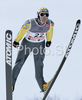 Matti Hautamaeki of Finland soars through the air during training jump of FIS Ski jumping World Cup finals in Planica, Slovenia. Training session for FIS Ski jumping World cup was held in Planica, Slovenia, on K215 ski flying hill on 14th of March, 2008.  <br> FIS Ski jumping World cup finals were held in Planica, Slovenia between 13th and 16th of March 2008.
