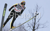 Janne Happonen of Finland soars through the air during training jump of FIS Ski jumping World Cup finals in Planica, Slovenia. Training session for FIS Ski jumping World cup was held in Planica, Slovenia, on K215 ski flying hill on 14th of March, 2008.  <br> FIS Ski jumping World cup finals were held in Planica, Slovenia between 13th and 16th of March 2008.

