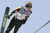 Janne Happonen of Finland soars through the air during training jump of FIS Ski jumping World Cup finals in Planica, Slovenia. Training session for FIS Ski jumping World cup was held in Planica, Slovenia, on K215 ski flying hill on 14th of March, 2008.  <br> FIS Ski jumping World cup finals were held in Planica, Slovenia between 13th and 16th of March 2008.

