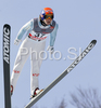 Tom Hilde of Norway soars through the air during training jump of FIS Ski jumping World Cup finals in Planica, Slovenia. Training session for FIS Ski jumping World cup was held in Planica, Slovenia, on K215 ski flying hill on 14th of March, 2008.  <br> FIS Ski jumping World cup finals were held in Planica, Slovenia between 13th and 16th of March 2008.
