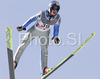 Gregor Schlierenzauer of Austria soars through the air during training jump of FIS Ski jumping World Cup finals in Planica, Slovenia. Training session for FIS Ski jumping World cup was held in Planica, Slovenia, on K215 ski flying hill on 14th of March, 2008.  <br> FIS Ski jumping World cup finals were held in Planica, Slovenia between 13th and 16th of March 2008.
