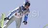 Gregor Schlierenzauer of Austria soars through the air during training jump of FIS Ski jumping World Cup finals in Planica, Slovenia. Training session for FIS Ski jumping World cup was held in Planica, Slovenia, on K215 ski flying hill on 14th of March, 2008.  <br> FIS Ski jumping World cup finals were held in Planica, Slovenia between 13th and 16th of March 2008.

