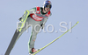 Thomas Morgenstern of Austria soars through the air during training jump of FIS Ski jumping World Cup finals in Planica, Slovenia. Training session for FIS Ski jumping World cup was held in Planica, Slovenia, on K215 ski flying hill on 14th of March, 2008.  <br> FIS Ski jumping World cup finals were held in Planica, Slovenia between 13th and 16th of March 2008.
