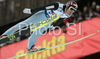 Bjoern Einar Romoeren of Norway soars through the air during first series of day 1 of FIS Ski jumping World Cup finals in Planica, Slovenia. Day 1 of FIS Ski jumping World cup finals was held in Planica, Slovenia, on K215 ski flying hill on 14th of March, 2008.  <br> FIS Ski jumping World cup finals were held in Planica, Slovenia between 13th and 16th of March 2008.
