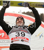 Winner Gregor Schlierenzauer of Austria celebrate his medal won in first race of FIS Ski jumping World Cup finals in Planica, Slovenia. Training and qualification sessions for FIS Ski jumping World cup were held in Planica, Slovenia, on K215 ski flying hill on 14th of March, 2008.  <br> FIS Ski jumping World cup finals were held in Planica, Slovenia between 13th and 16th of March 2008.
