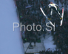 Matti Hautamaeki of Finland soars through the air during training jump of FIS Ski jumping World Cup finals in Planica, Slovenia. Training session for team event of FIS Ski jumping World cup was held in Planica, Slovenia, on K215 ski flying hill on 15th of March, 2008.  <br> FIS Ski jumping World cup finals were held in Planica, Slovenia between 13th and 16th of March 2008.
