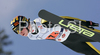 Janne Happonen of Finland soars through the air during first series of team event of FIS Ski jumping World Cup finals in Planica, Slovenia. Team event of FIS Ski jumping World cup finals was held in Planica, Slovenia, on K215 ski flying hill on 15th of March, 2008.  <br> FIS Ski jumping World cup finals were held in Planica, Slovenia between 13th and 16th of March 2008.
