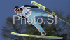 Bjoern Einar Romoeren of Norway soars through the air during first series of team event of FIS Ski jumping World Cup finals in Planica, Slovenia. Team event of FIS Ski jumping World cup finals was held in Planica, Slovenia, on K215 ski flying hill on 15th of March, 2008.  <br> FIS Ski jumping World cup finals were held in Planica, Slovenia between 13th and 16th of March 2008.
