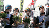 Second placed team Finland with Janne Happonen, Matti Hautamaeki, Jussi Hautamaeki celebrate their medals won in team event of FIS Ski jumping World Cup finals in Planica, Slovenia. Team event of FIS Ski jumping World cup were held in Planica, Slovenia, on K215 ski flying hill on 15th of March, 2008.  <br> FIS Ski jumping World cup finals were held in Planica, Slovenia between 13th and 16th of March 2008.
