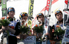 Second placed team Finland with Janne Happonen, Matti Hautamaeki, Jussi Hautamaeki celebrate their medals won in team event of FIS Ski jumping World Cup finals in Planica, Slovenia. Team event of FIS Ski jumping World cup were held in Planica, Slovenia, on K215 ski flying hill on 15th of March, 2008.  <br> FIS Ski jumping World cup finals were held in Planica, Slovenia between 13th and 16th of March 2008.
