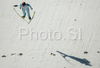 Jussi Hautamaeki of Finland soars through the air second jump in team event of FIS Ski jumping World Cup finals in Planica, Slovenia. Team event of FIS Ski jumping World cup was held in Planica, Slovenia, on K215 ski flying hill on 15th of March, 2008.  <br> FIS Ski jumping World cup finals were held in Planica, Slovenia between 13th and 16th of March 2008.
