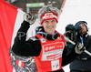 Winner of overall Ski jumping World Cup, Thomas Morgenstern of Austria celebrates with his World Cup trophy after FIS Ski jumping World Cup finals in Planica, Slovenia. Training session for race of FIS Ski jumping World cup was held in Planica, Slovenia, on K215 ski flying hill on 16th of March, 2008.  <br> FIS Ski jumping World cup finals were held in Planica, Slovenia between 13th and 16th of March 2008.

