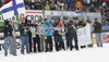 Finnish ski jumping team waiting for coach Tommi Nikunen in outrun of Planica ski flying hill after last race of FIS Ski jumping World Cup finals in Planica, Slovenia. Last race of FIS Ski jumping World cup were held in Planica, Slovenia, on K215 ski flying hill on 16th of March, 2008.  <br> FIS Ski jumping World cup finals were held in Planica, Slovenia between 13th and 16th of March 2008.
