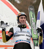 Third placed Janne Happonen of Finland celebrate his medal won in last race of FIS Ski jumping World Cup finals in Planica, Slovenia. Last race of FIS Ski jumping World cup were held in Planica, Slovenia, on K215 ski flying hill on 16th of March, 2008.  <br> FIS Ski jumping World cup finals were held in Planica, Slovenia between 13th and 16th of March 2008.
