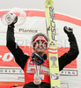 Winner of overall Ski jumping World Cup, Thomas Morgenstern of Austria celebrates with his World Cup trophy after FIS Ski jumping World Cup finals in Planica, Slovenia. Training session for race of FIS Ski jumping World cup was held in Planica, Slovenia, on K215 ski flying hill on 16th of March, 2008.  <br> FIS Ski jumping World cup finals were held in Planica, Slovenia between 13th and 16th of March 2008.
