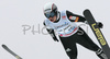 Jernej Damjan of Slovenia soars through the air in second jump of last race of FIS Ski jumping World Cup finals in Planica, Slovenia. Last race of FIS Ski jumping World cup was held in Planica, Slovenia, on K215 ski flying hill on 16th of March, 2008.  <br> FIS Ski jumping World cup finals were held in Planica, Slovenia between 13th and 16th of March 2008.
