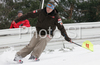 Finnish coach Tommi Nikunen skiing down the ski jumping hill in Planica, after last race of FIS Ski jumping World Cup finals in Planica, Slovenia, which was also his last race as coach of Finnish team. Last race of FIS Ski jumping World cup was held in Planica, Slovenia, on K215 ski flying hill on 16th of March, 2008.  <br> FIS Ski jumping World cup finals were held in Planica, Slovenia between 13th and 16th of March 2008.
