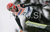 Michael Uhrmann of Germany soars through the air during first round of day 1 of FIS Ski jumping World Cup finals in Planica, Slovenia. First day of FIS Ski jumping World cup finals was held on Friday, 20th of March 2009 in Planica, Slovenia.
