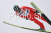 Third placed Dimitry Vassiliev of Russia soars through the air during first round of day 1 of FIS Ski jumping World Cup finals in Planica, Slovenia. First day of FIS Ski jumping World cup finals was held on Friday, 20th of March 2009 in Planica, Slovenia.
