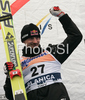 Second placed Adam Malysz of Poland celebrates his medal won in day 1 of FIS Ski jumping World Cup finals in Planica, Slovenia. First day of FIS Ski jumping World cup finals was held on Friday, 20th of March 2009 in Planica, Slovenia.
