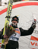 Second placed Adam Malysz of Poland celebrates his medal won in day 1 of FIS Ski jumping World Cup finals in Planica, Slovenia. First day of FIS Ski jumping World cup finals was held on Friday, 20th of March 2009 in Planica, Slovenia.

